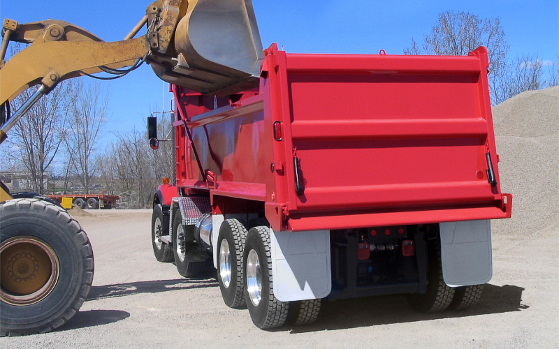 Dump Truck Being Filled material hauling